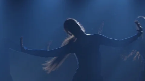 Slow motion of three ballerinas dancing elements of ballet. Close-up Stock Footage 111204058