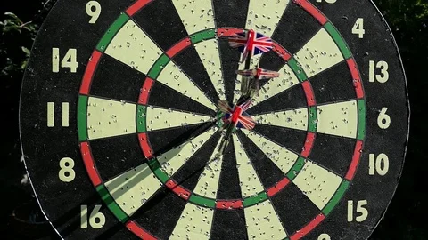 Slow Motion Three Dars Hitting The Hanging Board Video stock 81018045