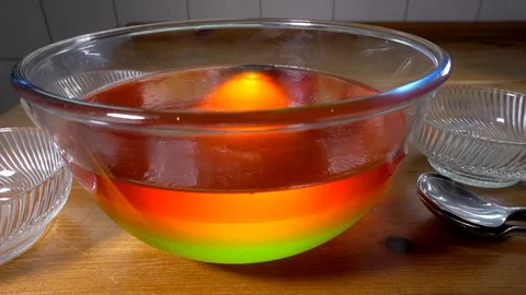 Slow motion – Three layer bowl of jelly. Stock Footage 107540894
