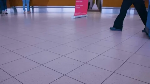 Slow motion of three people walking through airport wheeling luggage 480fps 스톡 동영상 123173335