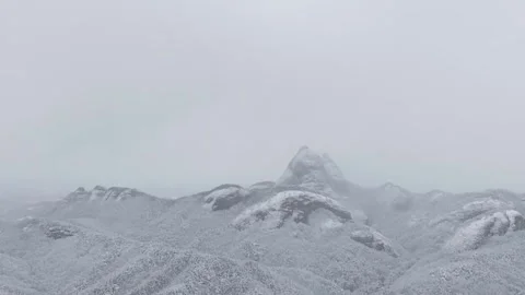 Slow Motion Through Heavy Snow Toward Snowy Mountain Peaks in South Korea Stock Footage 344247815