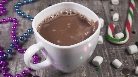 Slow motion throw marshmallows in a mug of hot chocolate Stock Footage 95851740
