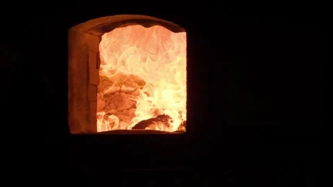 Slow motion of throwing stacks of joss paper into fireplace in Taiwan temple 2 Stock Footage 303307200