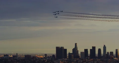 Slow motion of thunderbirds fly over downtown los angeles celebrating upcoming Stock Footage 115471693