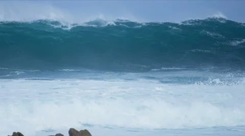 Slow Motion Tidal Waves Crashing Over Jagged Rocks Stock Footage 21831677