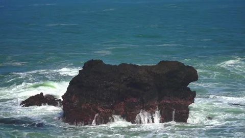 Slow motion of tidal waves hits the coral rock on the sea Stock Footage 251513646