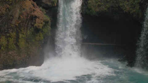 Slow Motion Tilt Down of Beautiful Pacific Northwest Waterfall Stock Footage 96003769