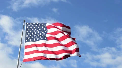 Slow Motion Tilt Down Reveals Large American (USA) Flag in Wind Stock Footage 64399133