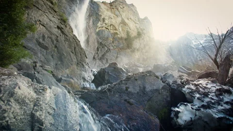 Slow motion tilt up from a river stream to Horseshoe Falls Stock Footage 230554210