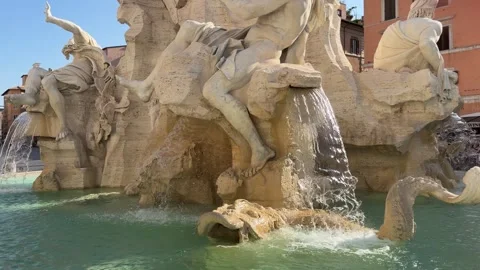 Slow motion tilt up shot of Four Rivers Fountain in Piazza Navona Rome Stock-Footage 345657685
