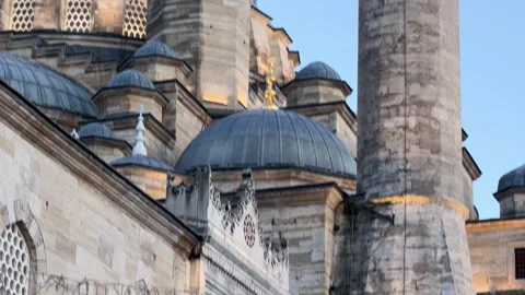 Slow motion tilt up shot lead domes and towering stone minaret Stock Footage 340154812