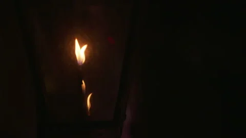 Slow Motion Tilt-Up Shot Of Lit Gas Lamps Mounted On Wall At Night - Los Stock Footage 236992389