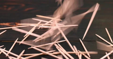 Slow motion for toothpicks scattered on the table Stock Footage 147334046