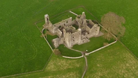 Slow motion top down aerial orbiting Bective Abbey Stock Footage 291266387