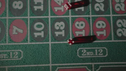 Slow motion top-down tracking hand then dices on felt Vídeos de archivo 335699966