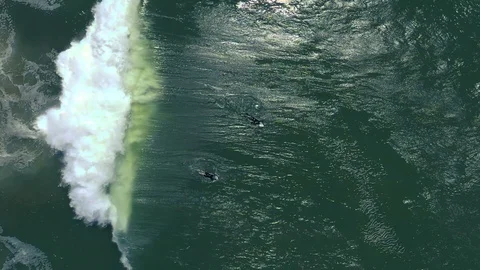 Slow-motion top-down view as wave crashes over surfer Stock Footage 112709267