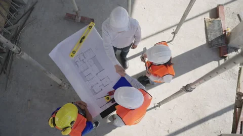Slow motion, Top view of construction engineering team join hands. Stock Footage 171615383