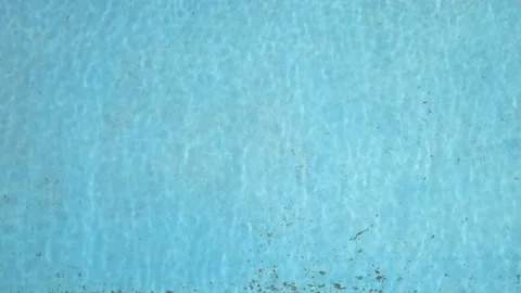 Slow motion top view of water in a swimming pool Stock Footage 202228590