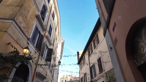 Slow Motion Tracking Shot Of Authentic Street Life In Ancient Rome 動画素材 328846146