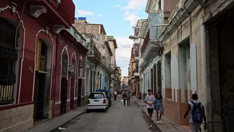 Slow motion tracking shot of historic buildings in Havana Cuba. Stock Footage 242102541