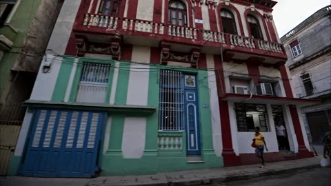 Slow motion tracking shot of historic buildings in Havana Cuba. Stock Footage 242174646