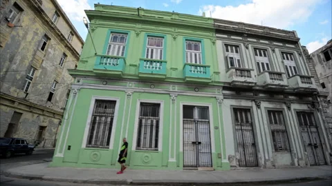 Slow motion tracking shot of historic buildings in Havana Cuba. Stock Footage 242182115