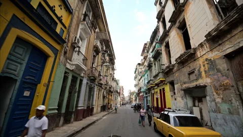 Slow motion tracking shot of historic buildings in Havana Cuba. Stock Footage 242236095