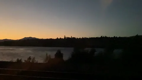 Slow Motion Tracking Shot of Horizon at Sunset Stock Footage 156973470