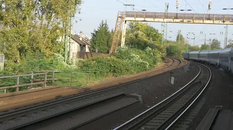 Slow motion tracking shot from moving train on rails Stock Footage 43199295