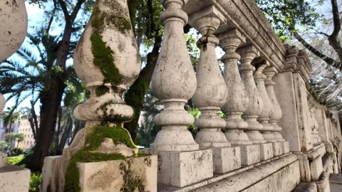 Slow Motion Tracking Shot Of Ornamental Fence Bordering Historic Park Stockbeeldmateriaal 330122740
