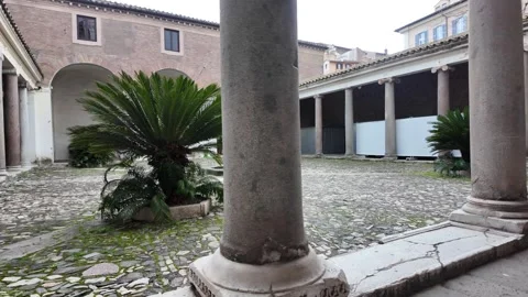 Slow Motion Tracking Shot Of Romanesque Atrium At San Clemente 動画素材 330122838