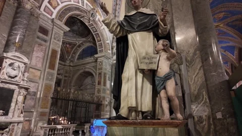 Slow Motion Tracking Shot Of Saint Vincent Ferrer Statue With Warm Bokeh Stock Footage 328842704