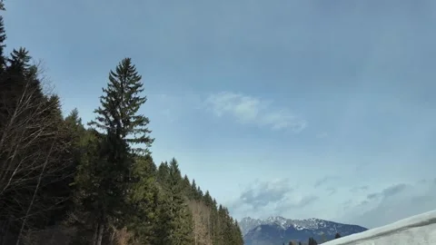 Slow Motion Tracking Shot Of Winter Road And Snowy Houses In Austrian Alps Stock Footage 328695049