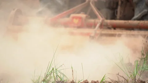 Slow motion tractor plowing and working prepare soil land for plantation in farm Vidéo 136906655