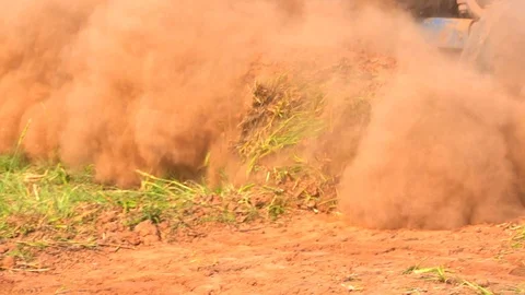Slow motion tractor plowing soil grass filed farm agriculture for planting tree 库存影片 106663695