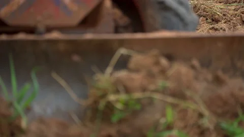 Slow motion tractor plowing soil in farm agriculture, preparation for seeding pl 库存影片 145547773