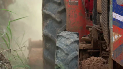 Slow motion tractor plowing soil land of farm agriculture  Stock-Footage 147188276