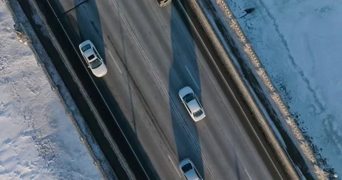 Slow Motion Traffic On 169 Bridge In Winter Champlin Minnesota - Drone Shot Video stock 228894471
