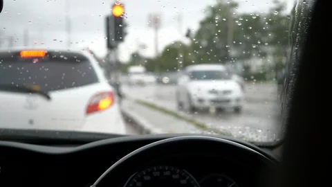 Slow motion, traffic jam in rainy day scene Stock Footage 96587215
