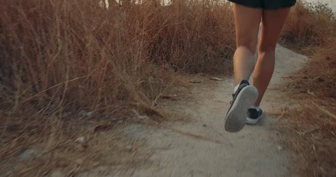 SLOW MOTION, Trail Running in forest grass, Athlete fit two woman exercise Stock-Footage 124422199