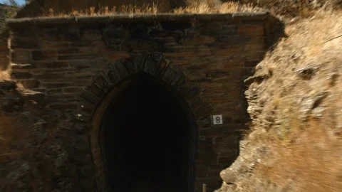 Slow motion train exiting tunnel rear view Stock Footage 88381471