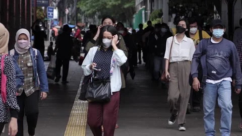 Slow motion Train passengers wearing protective masks walk Stock Footage 171522510