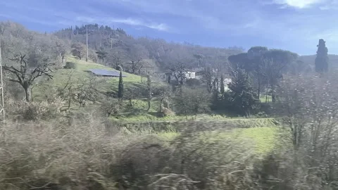 Slow Motion Train View Across Italian Countryside Stock Footage 306799119