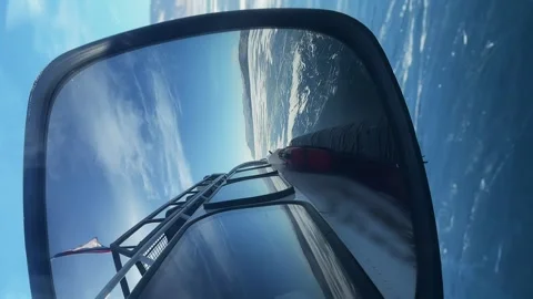 Slow motion. a trip through the frozen lake Baikal on a hovercraft Stock Footage 273374594