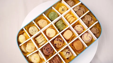 Slow motion turntable Biscuits Cookies box turning Stock Footage 169074133