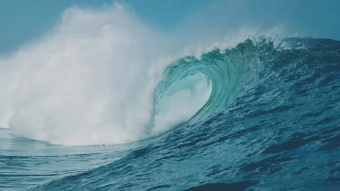 Slow motion of Turquoise waves in ocean Breaking wave with sun light Abstract Stock Footage 336585781