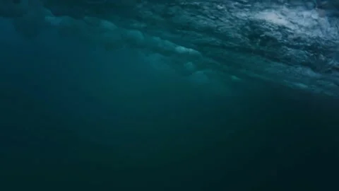 Slow motion of Turquoise waves in ocean Breaking wave with sun light Abstract 스톡 동영상 336585788