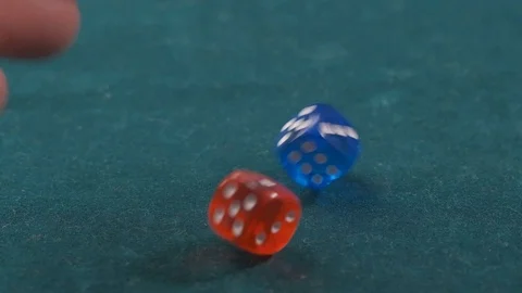Slow motion two dice rolling on casino table. Stock Footage 120059378