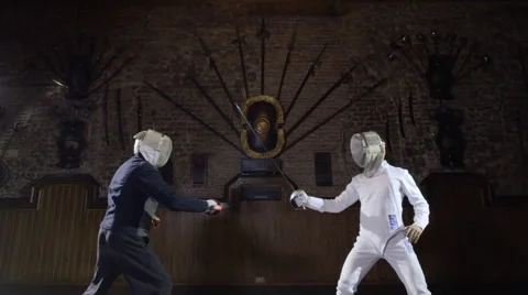 Slow motion Two fencers in fierce duel Video stock 66699557