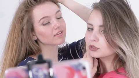 Slow-Motion of Two Girls Making Selfie Stock Footage 82299084